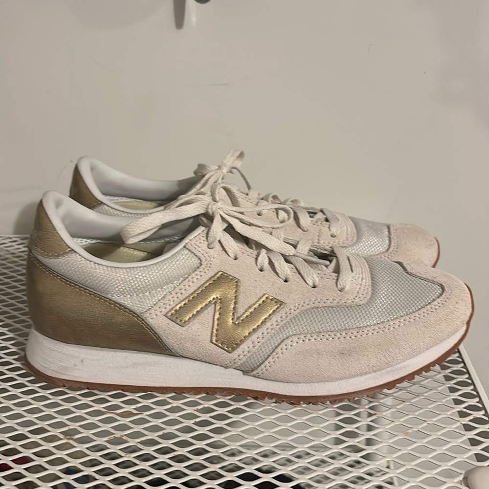 New Balance White and Gold Sneakers